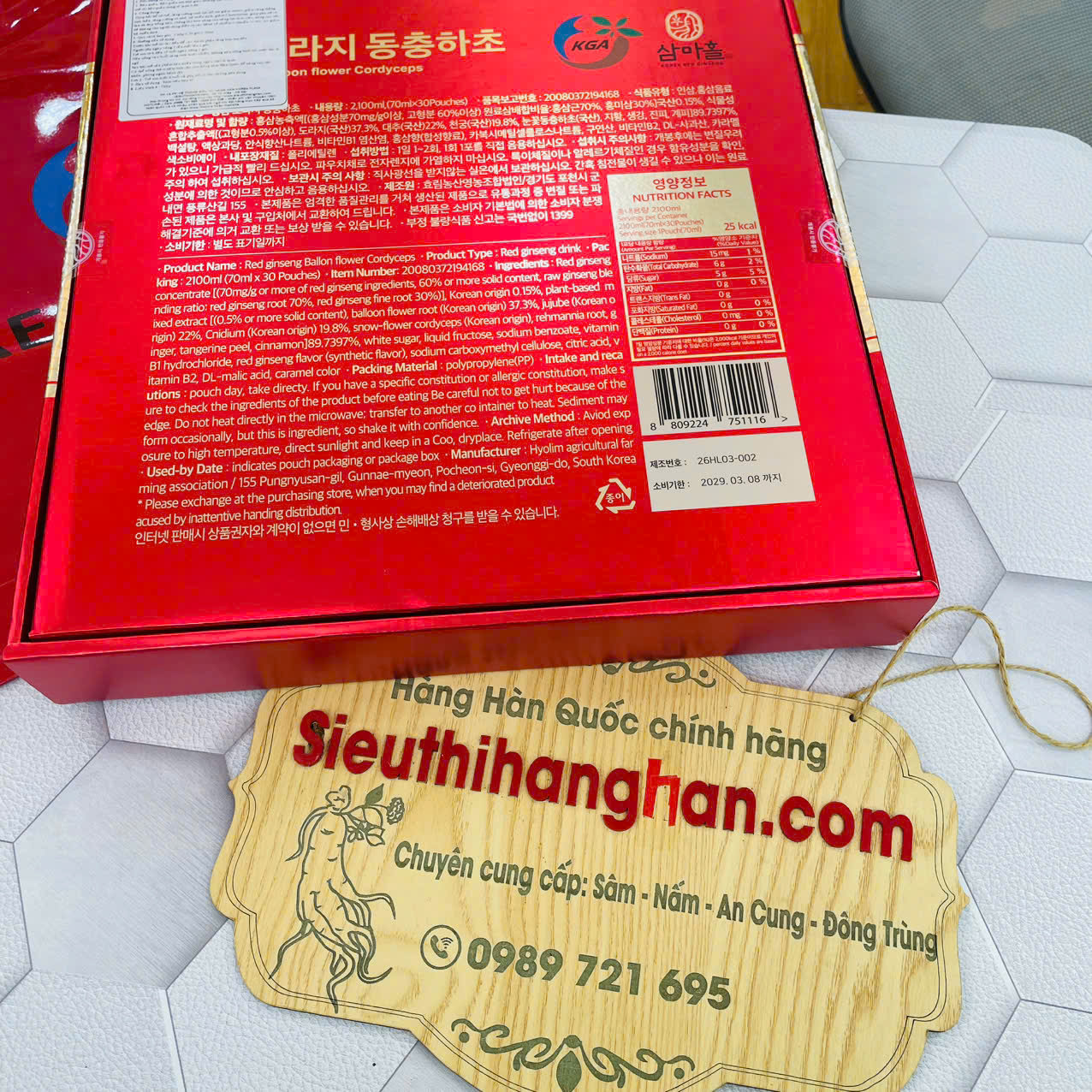 Tem nhãn kiểm định chất lượng trên hộp nước ép hồng sâm nhập khẩu Hàn Quốc